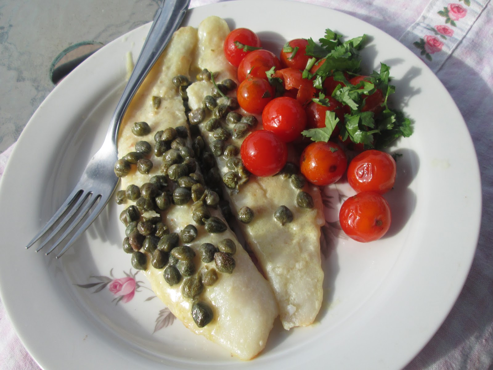 Canela kitchen (gloria) Fish with capers sauce and cherry tomatoes