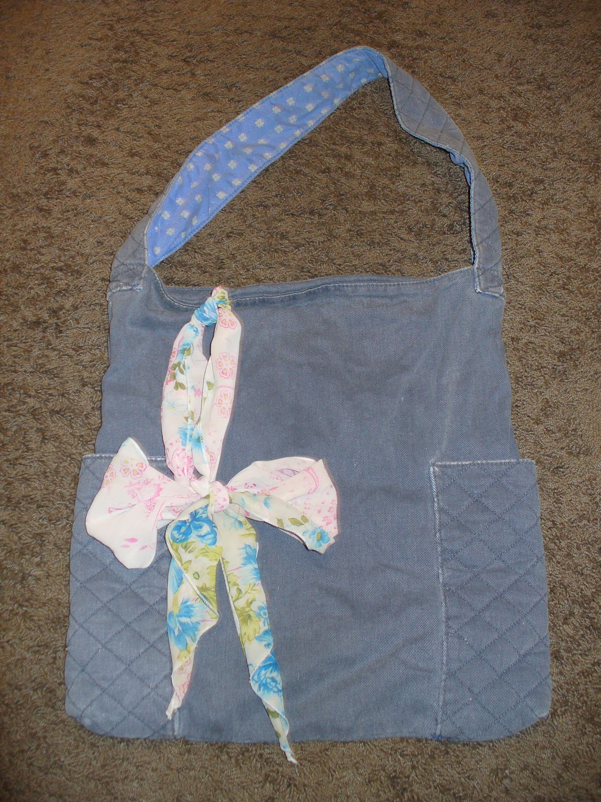 Kai Leigh Bow 22 Ways to Make a Boring Bag Exciting Using Only a Scarf.