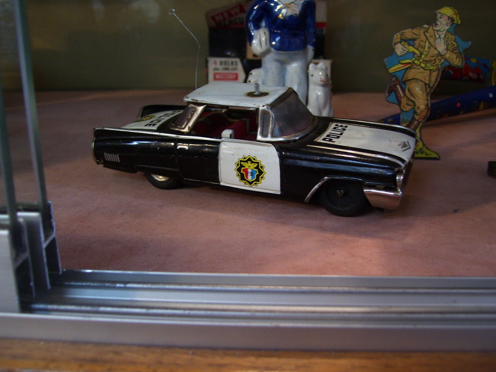 Estate Shop: Vintage Toy Badges and 1950's Cadillac Tin ...