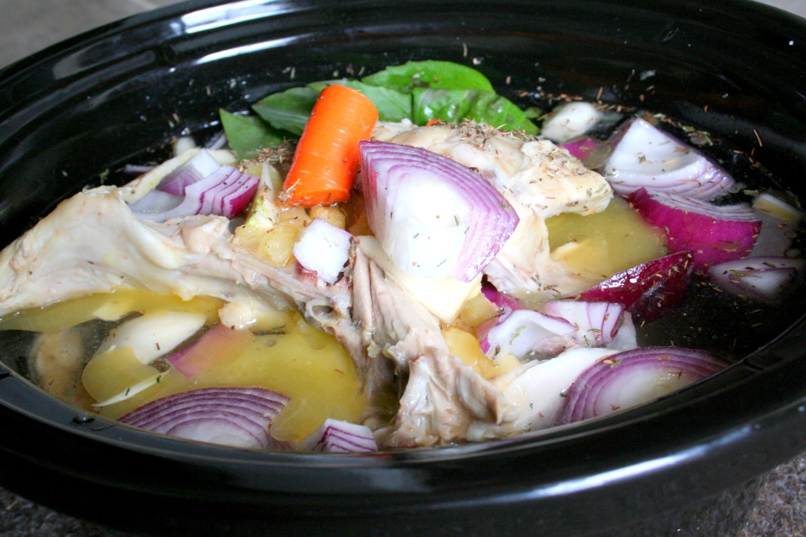 The Healthy Happy Wife Homemade Chicken Broth in the Crock Pot