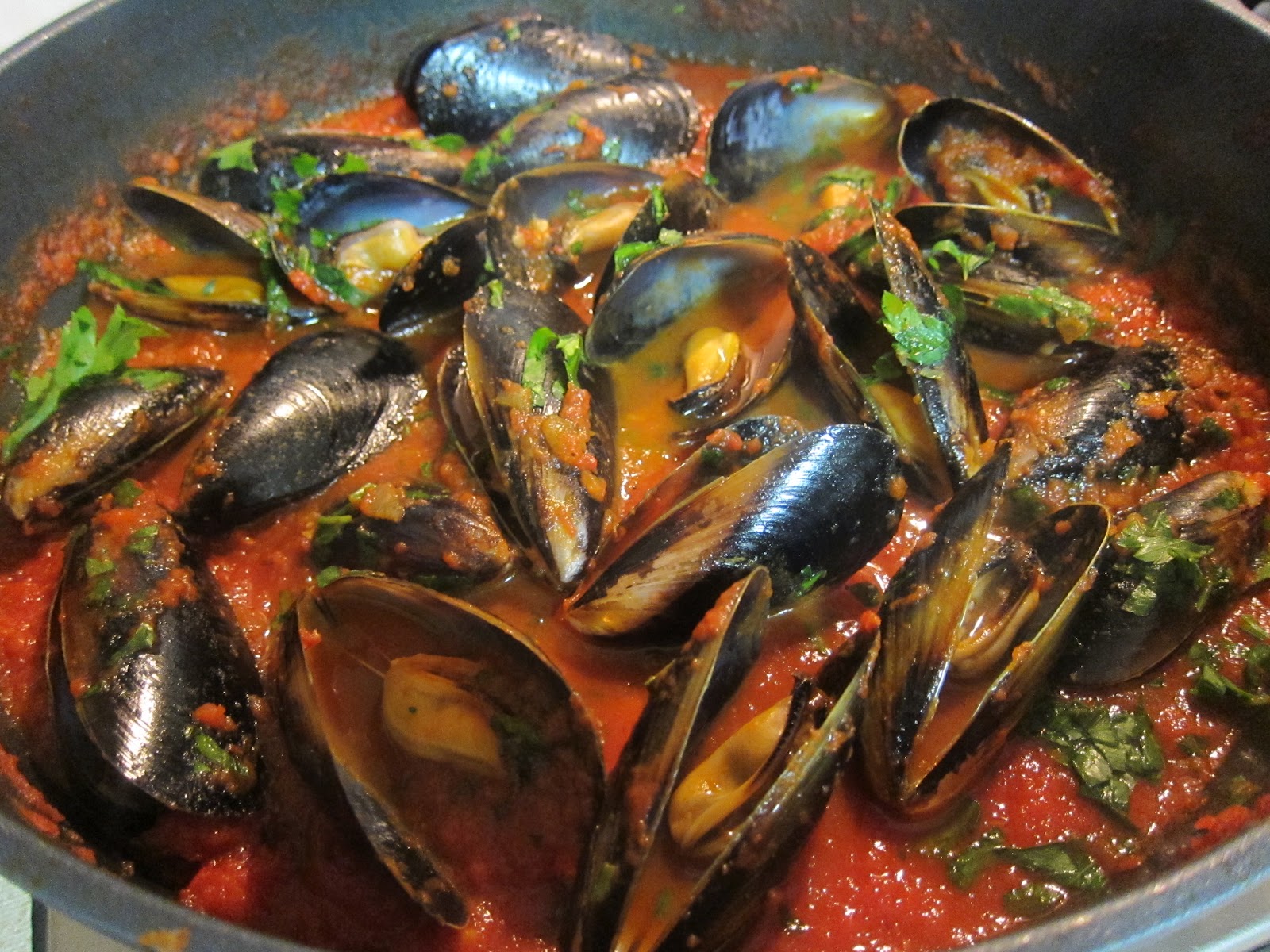 Saucy Thyme Braised Mussels with Tomato, Chilli and Basil