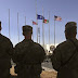U.S. Marines stand at attention during a handover ceremony