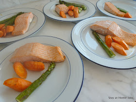 kid and adult portions of salmon, asparagus and carrots
