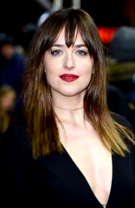 Dakota Johnson39s Plunging Neckline and Red Lipstick   Vogue Dakota Johnson39s Plunging Neckline and Red Lipstick   Vogue