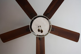 view of the temporary DIY diffuser on the drum shade from below the ceiling fan 