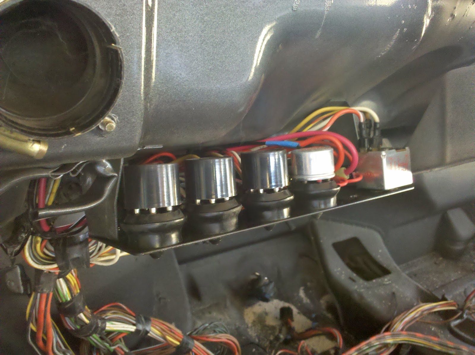 And here it is mounted back into its proper place. I've placed an order for  a second fuse block and will mount it under the dashboard too, to provide  fuses ...