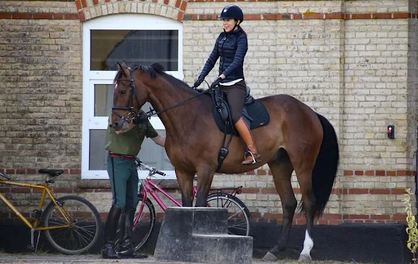 Crown Princess Mary and Crown Prince Frederik of Denmark at Gråsten Palace on horseback