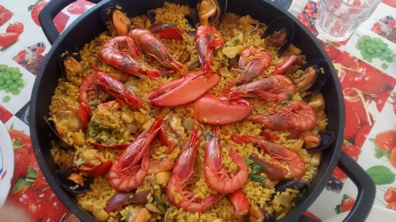 salud y felicidad Paella de Marisco con Bogavante