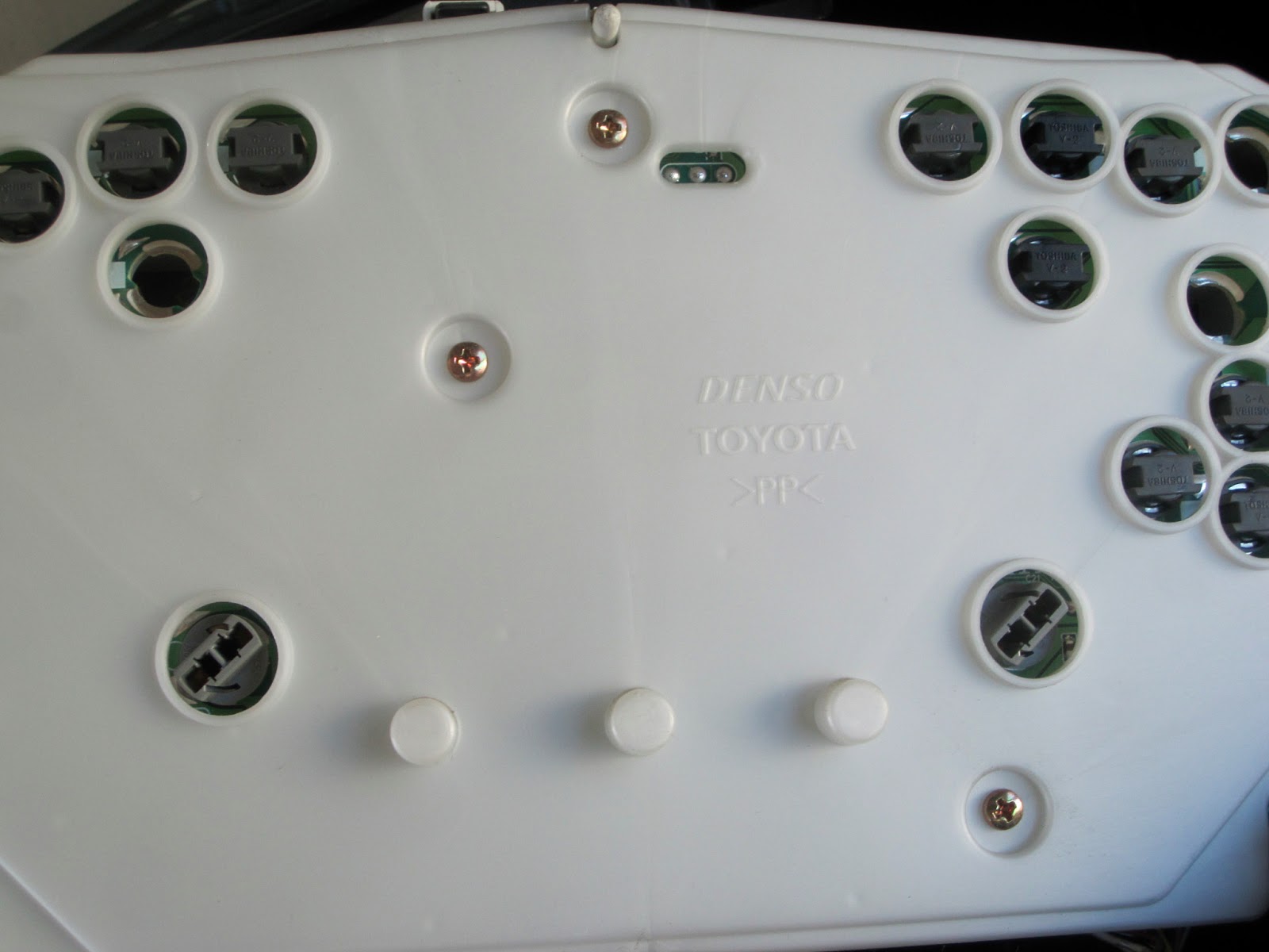 Mess of the Day PSA Changing a lightbulb behind the dash of a Toyota Echo