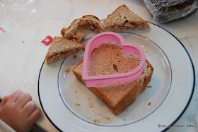 use a cookie cutter to create a heart shaped sandwich for valentine's day