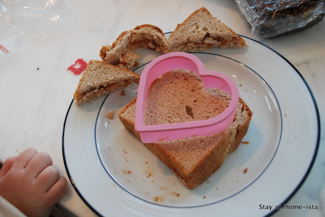 use a cookie cutter to create a heart shaped sandwich for valentine's day