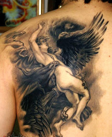 fighting angel tattoo design on the back