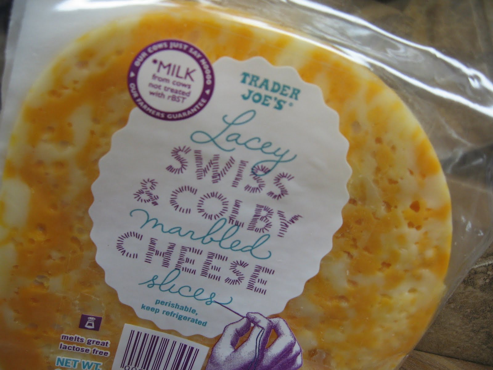 Please, DON'T pass the salt! Trader Joe's Lacey Swiss & Colby Cheese