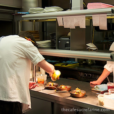 Everyday London - thecafesucrefarine.com A photo of chefs preparing meals at Nopi Restaurant in London, England.