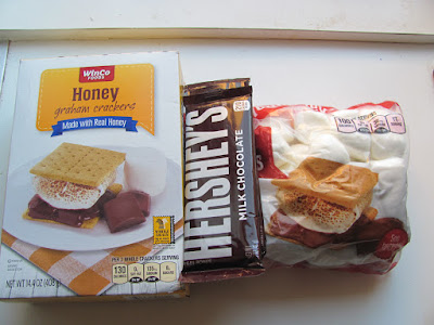 Graham crackers, Hershey's chocolate, and marshmallows. Ingredients for s'mores