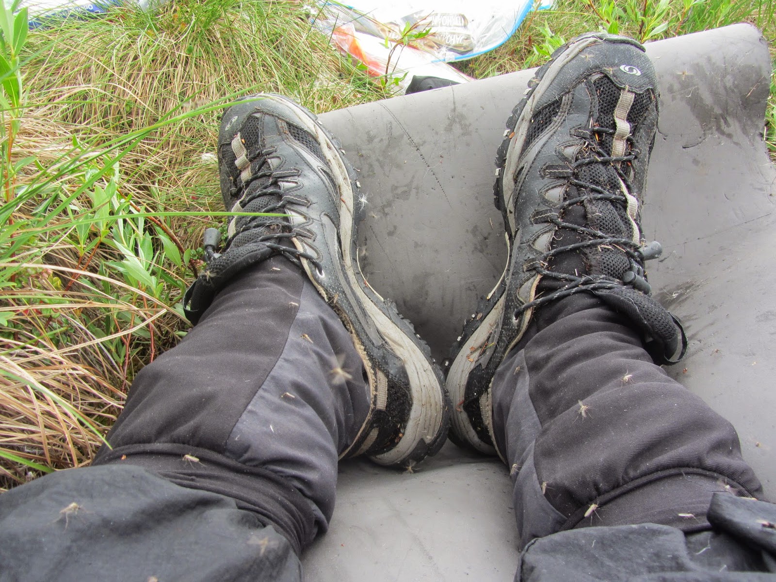 Brooks Range gear reflections on stove and footwear