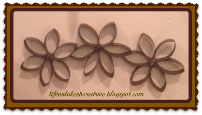 alt="toilet paper roll flower wall art"