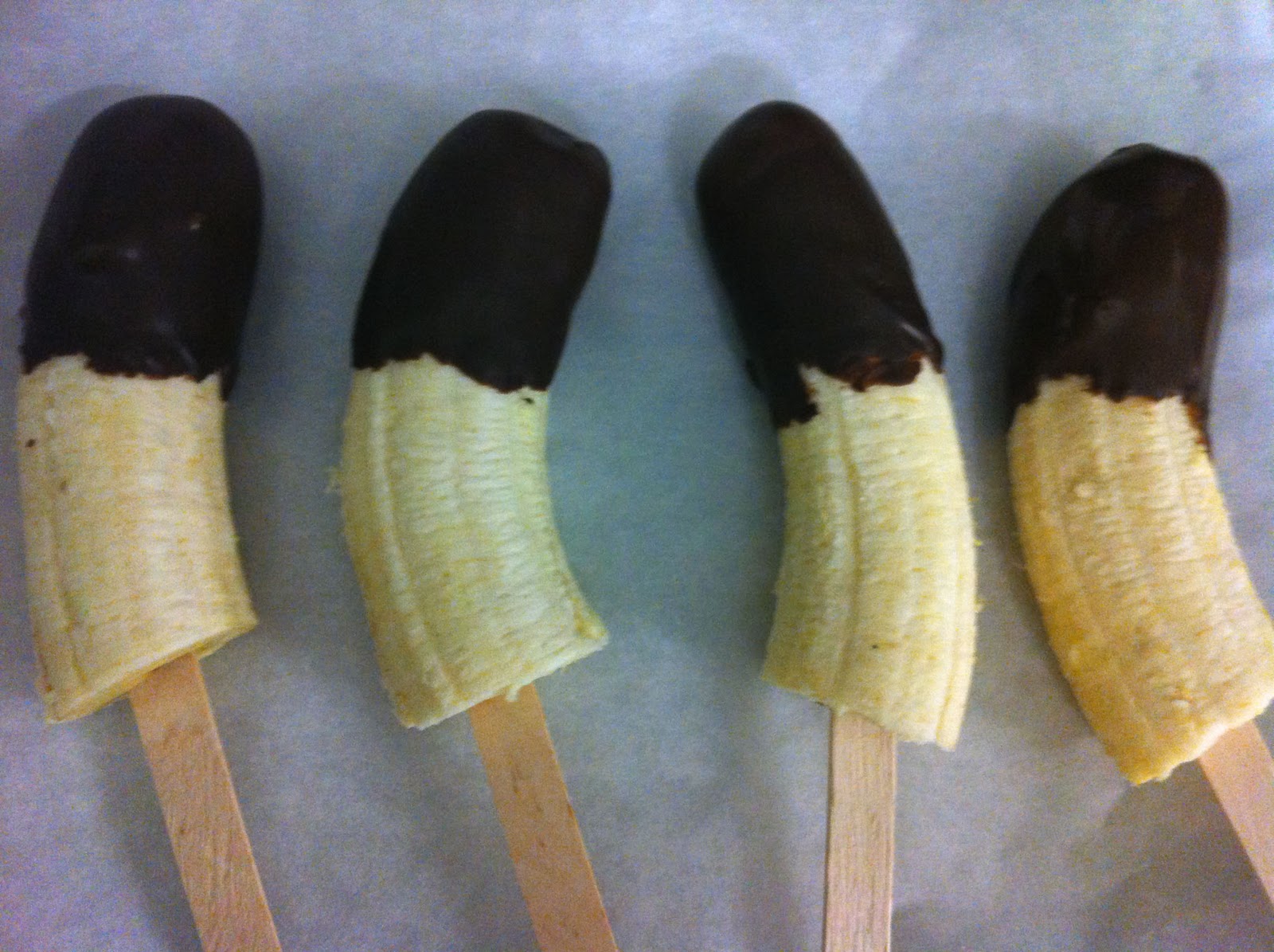 Skinny Healthy Lifestyle Frozen chocolate “ChocTop” banana on a stick