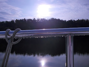 Dew on the rail on a chilly morning.  Brrrr. Anchored on the edge of the Ohio.