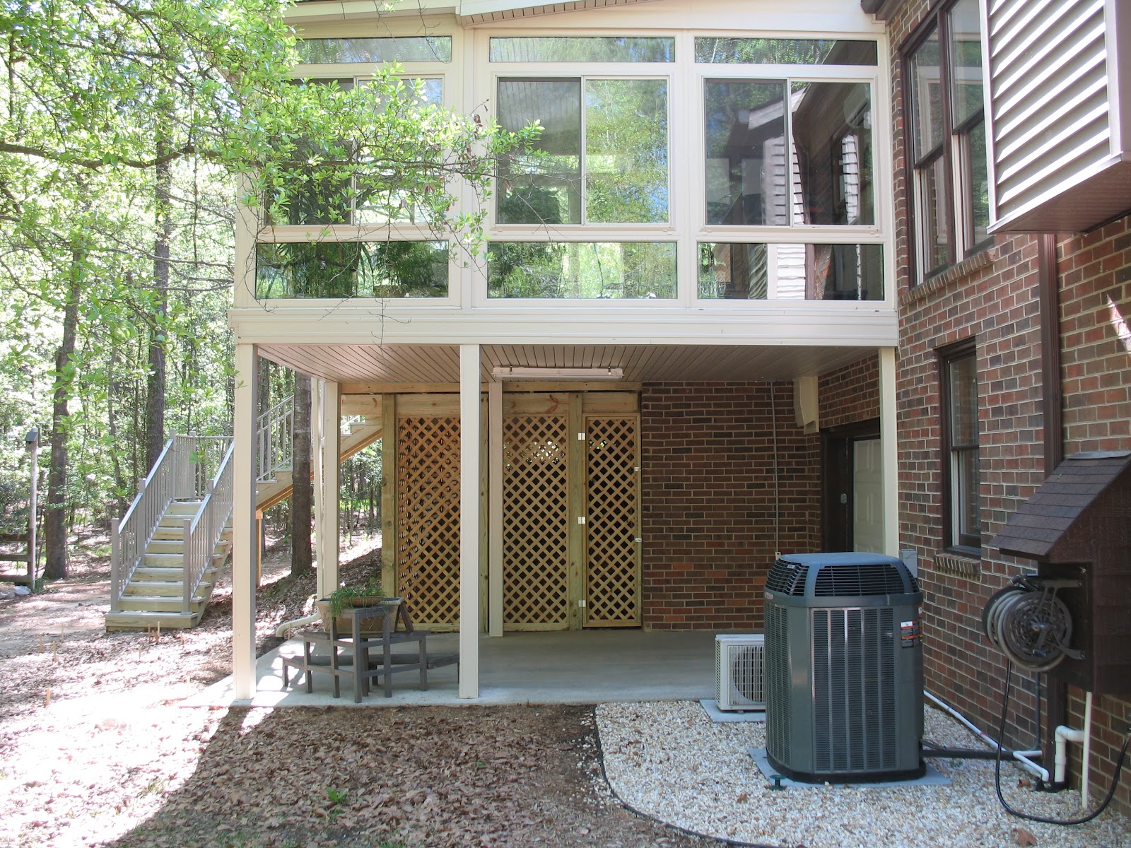 Under Deck Doors & Under Deck Patio Modern With Gravel Brown Tiles