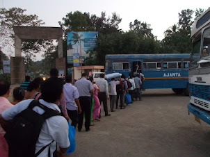 Launch commuters in a queue for the "Shuttle Bus" to Alibaug from Mandwa Jetty.