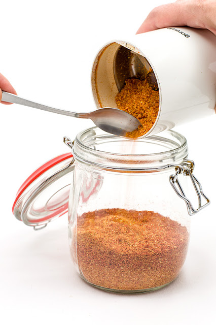 Grinded dry chili into a jar