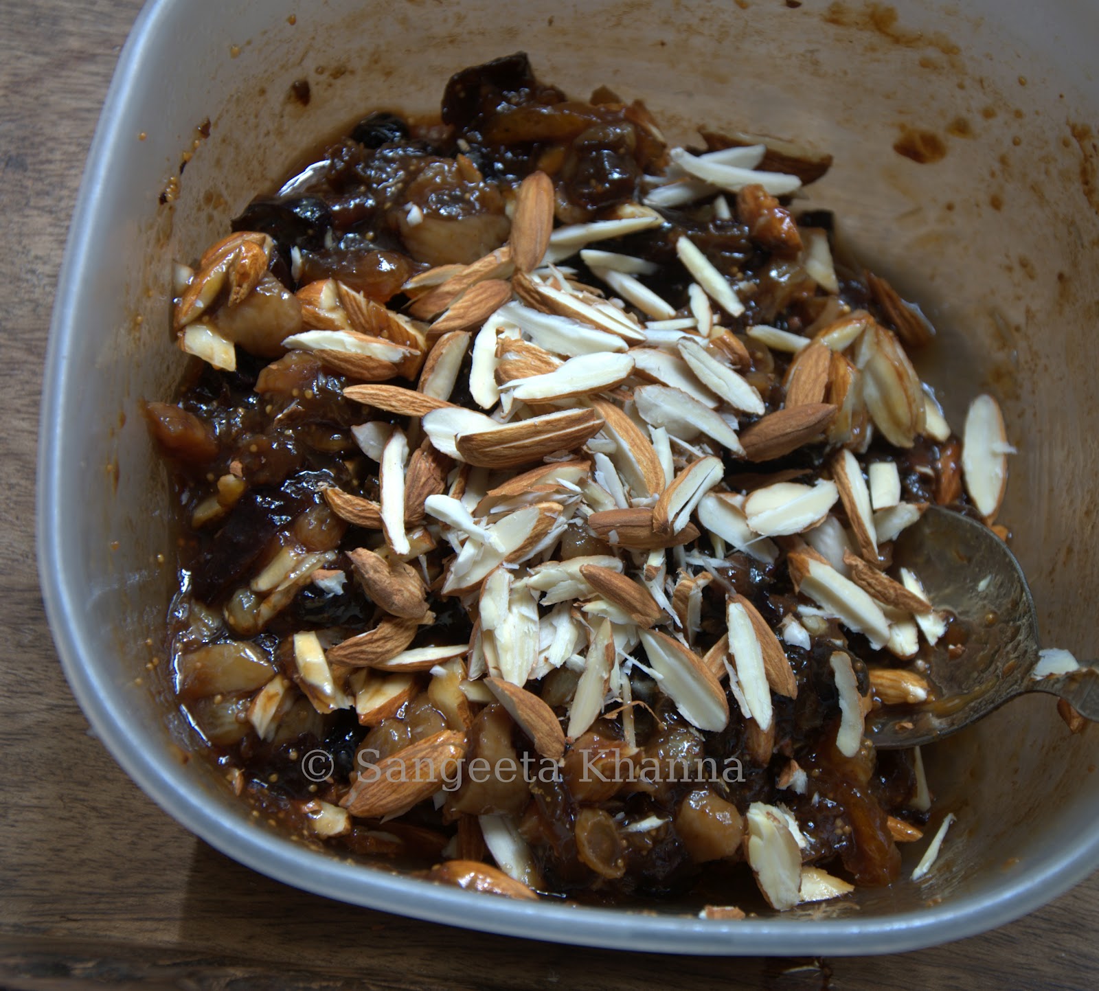 a gluten free Panforte dried prunes, figs and nuts together in a