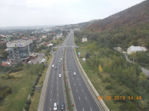 A view of the broad roads of Almaty city while travelling by Kok-Tobe Cable car.