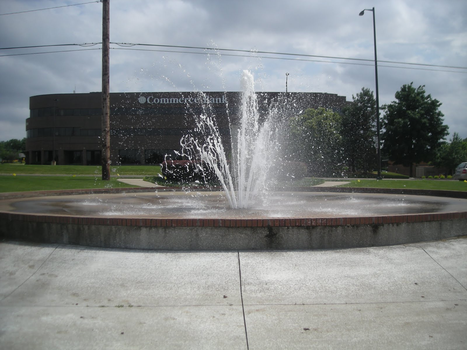 Cutting Coupons in KC Kansas City Tour of Fountains Kansas Side Fountains
