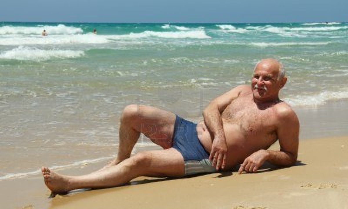 Naked old people at the beach