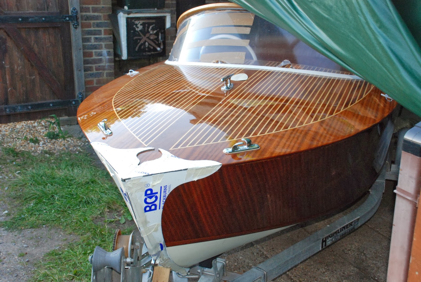 my wooden speed boat build Stainless steel trim and Bow plate