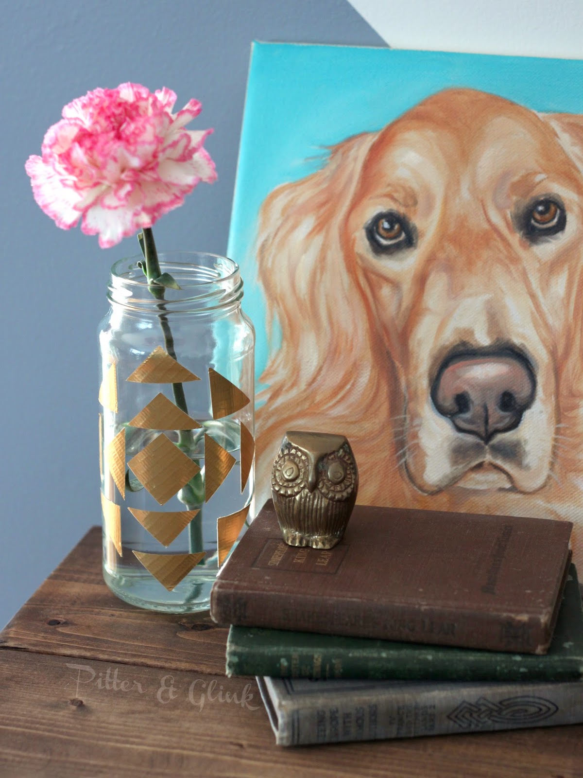 Create a trendy geometric print vase using a recycled glass jar and Duck tape! PitterandGlink.com
