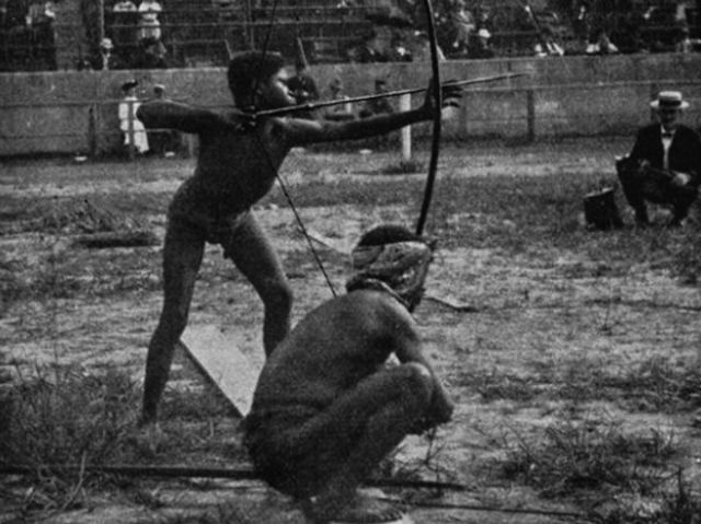 Human zoos existed 16 Depressing Photos That Will Destroy Your Faith In Humanity - Here, people of indigenous races are shown participating in archery at the “Savage Olympics Exhibition” organised in 1904 in St Louis by the whites.