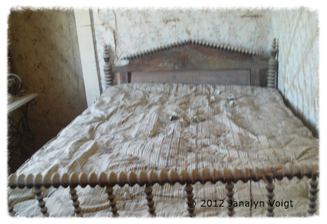 Bed with coverlet at Bodie, California