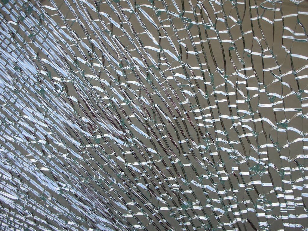 shattering glass reaction the top of a water-filled glass bottle, causing the bottom to shatter, these violent reactions catastrophically crack the bottom of the bottle. shattering glass reaction the top of a water-filled glass bottle, causing the bottom to shatter, these violent reactions catastrophically crack the bottom of the bottle.