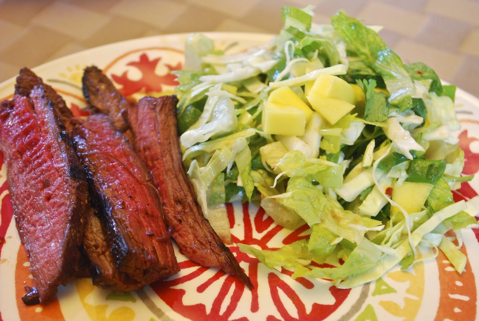 grilled asian flank steak with mango salad