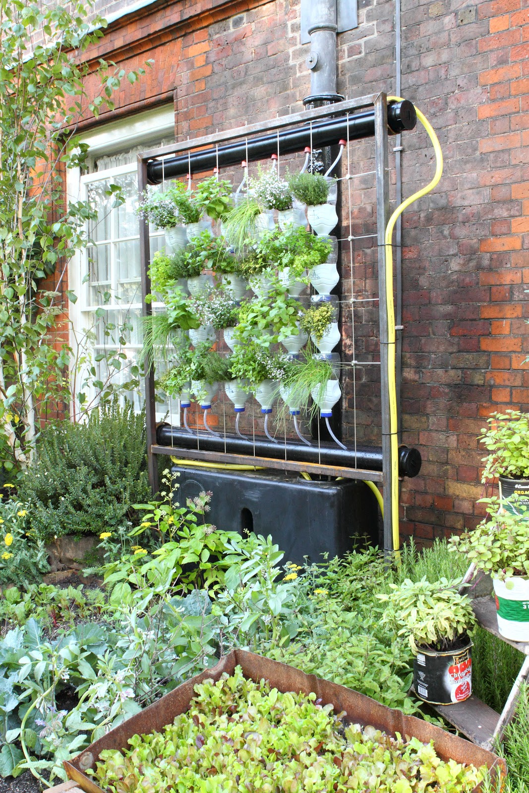 This garden featured a vertical hydroponic system made with old ...