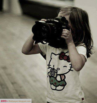 cute-sweet-little-baby-capture-photos-with-her-camera