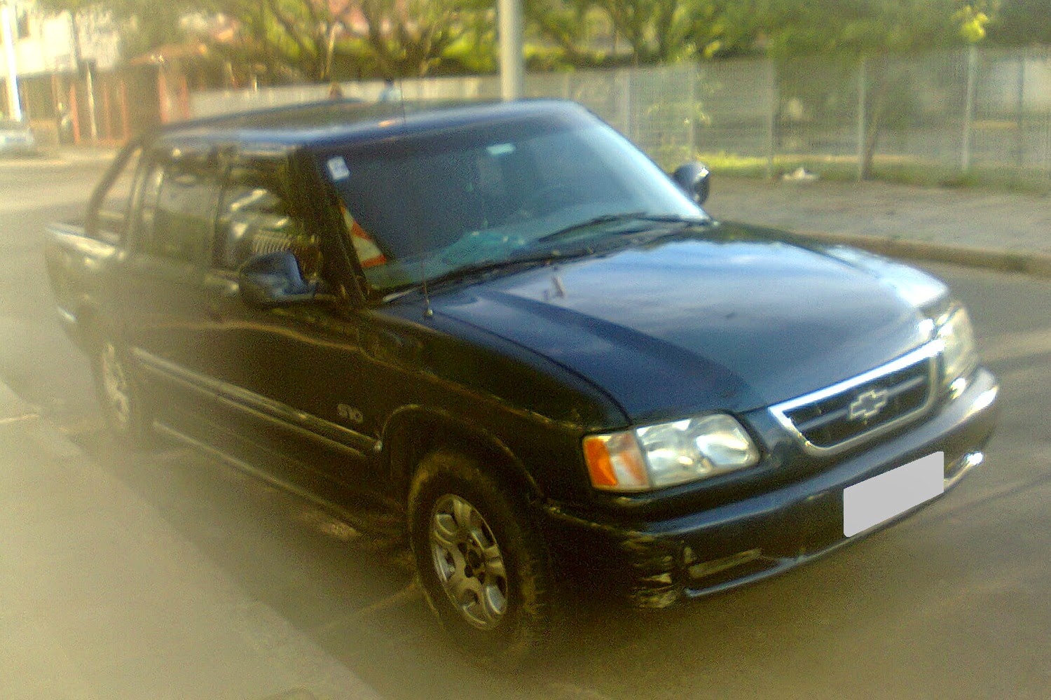 A few trucks converted to bifuel gasoline/CNG in my hometown Fuel