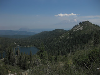 Mt. Shasta rises above the smoke layer, near Mt. Shasta, California