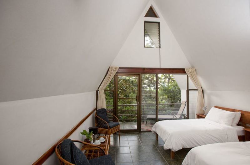 A-Frame Cottages. Soaring ceilings add spaciousness and light. Option of king-size or two twin beds