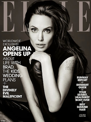 Angelina Jolie wears a simple black top with leather trousers for the cover Elle US magazine