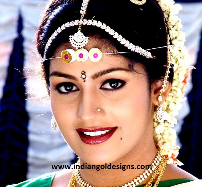 Gold and Diamond jewellery designs kannada actress radhika in bridal