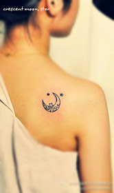 crescent totem moon tattoo with three little stars nearby