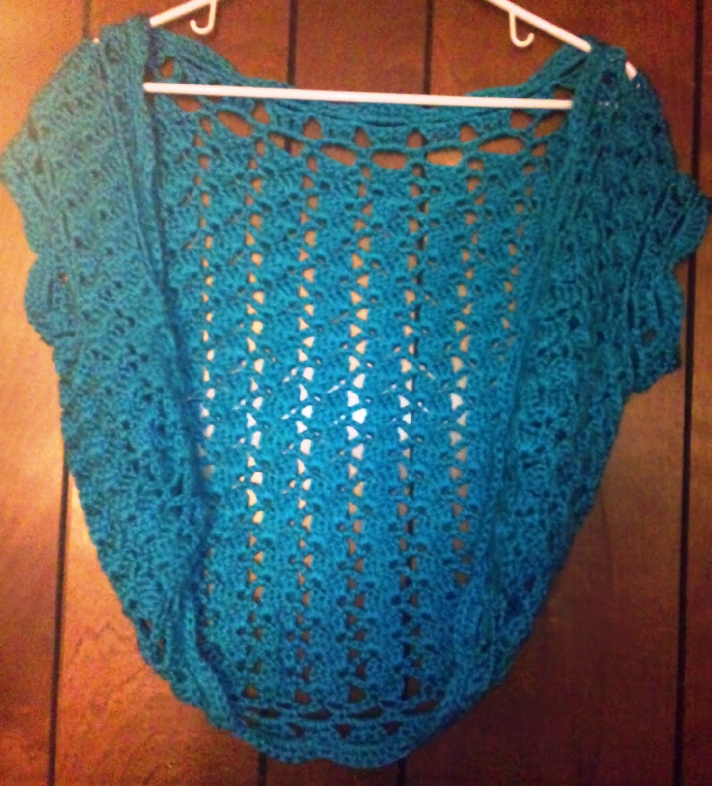 Teal Shrug