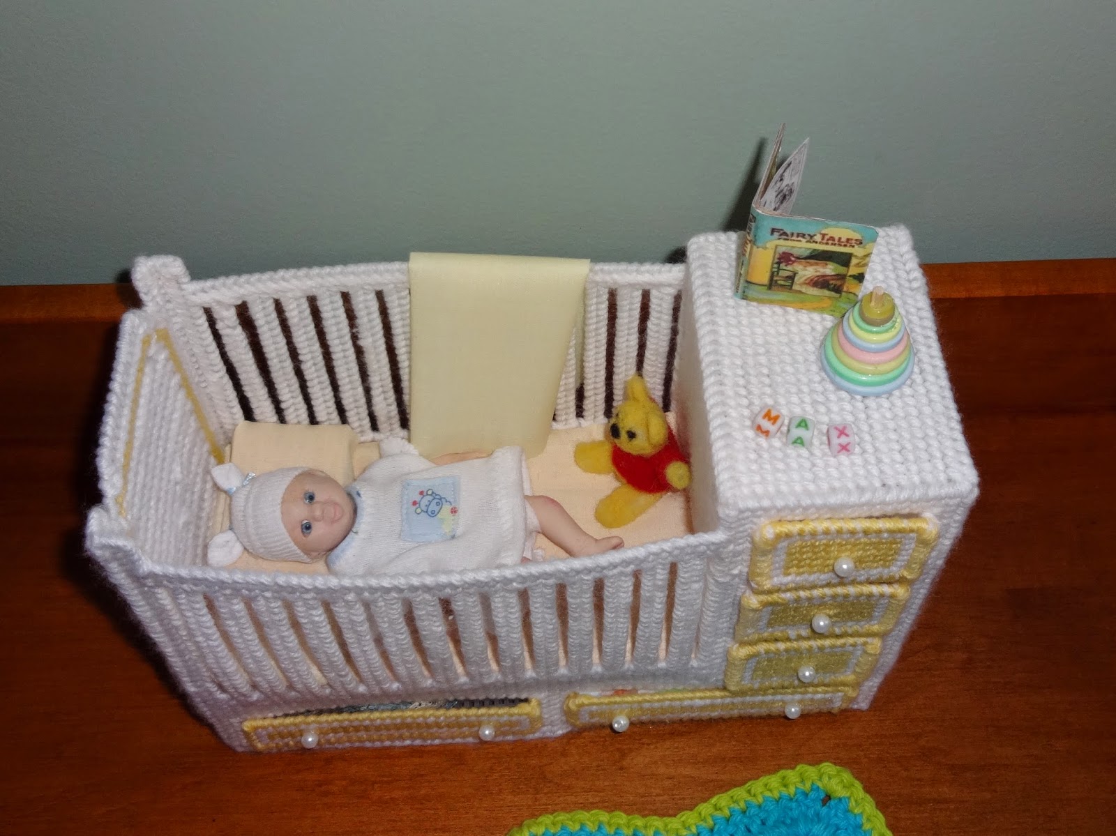 Crafty Kat Plastic canvas crib, mini toys, and sewing for OOAK dolls