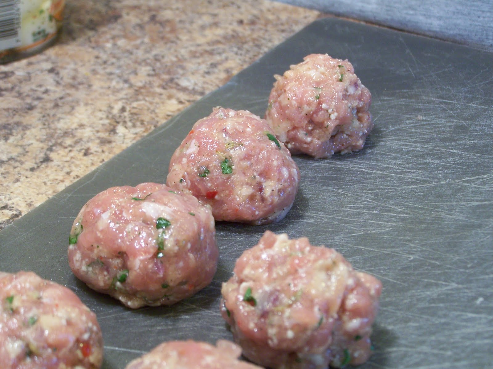 The Peppered Pantry Sausage Stuffed Meatballs
