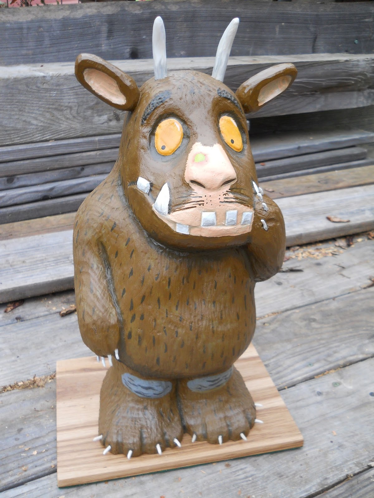 Carving a statue inspired by the Gruffalo carved using some rather