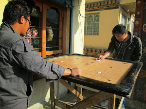 "Carrom" is a common pass-time  in Bhutan.