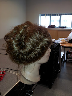On scalp fishtail braid on a sally head at the Anne Veck Hair course
